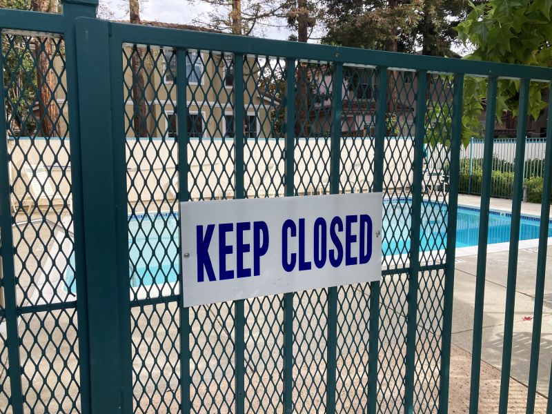 Mesh Fence Secured Around Pool